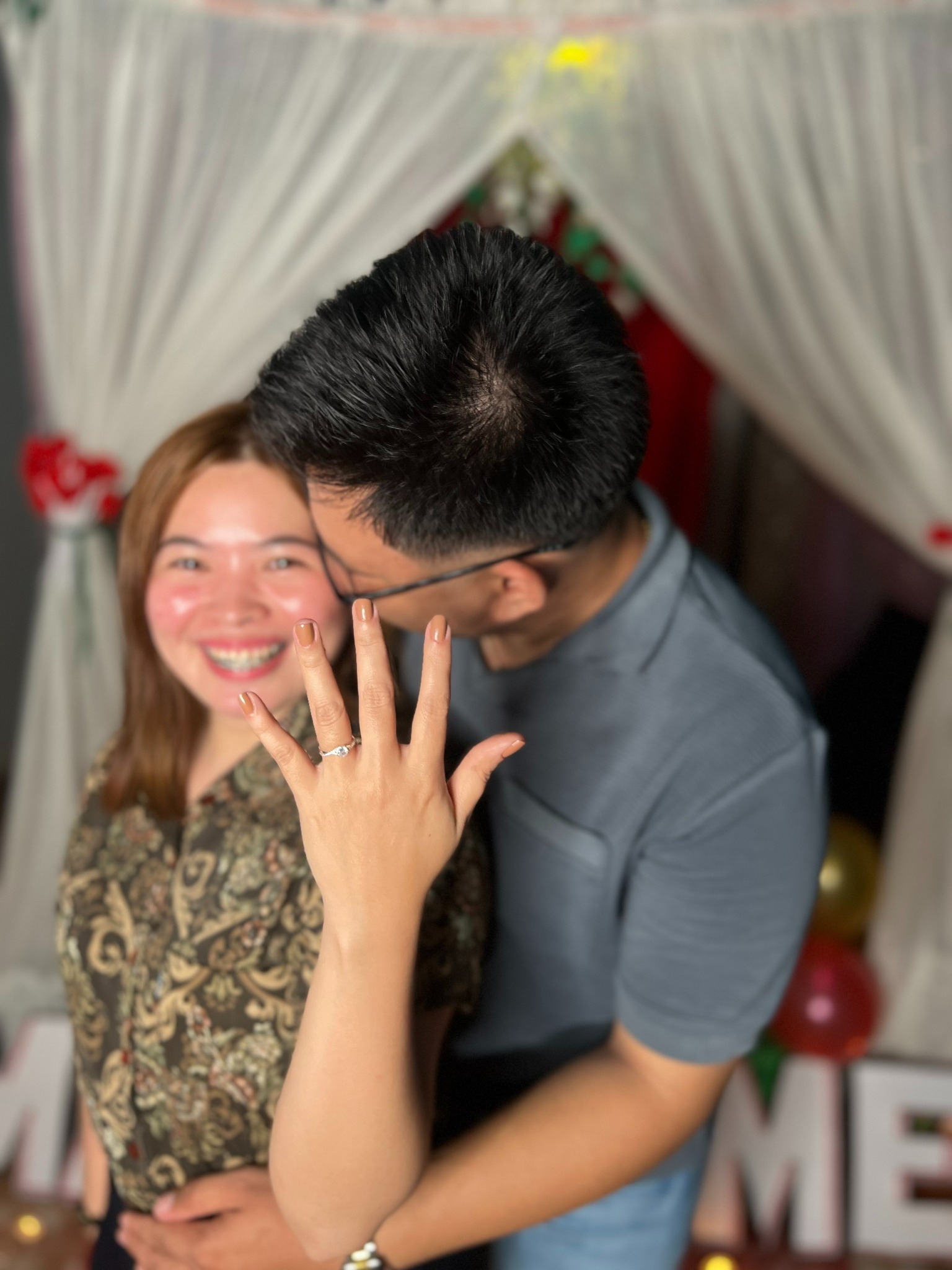 Renz and Emie celebrating their marriage proposal